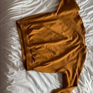 A gently used oversized brown sweatshirt.